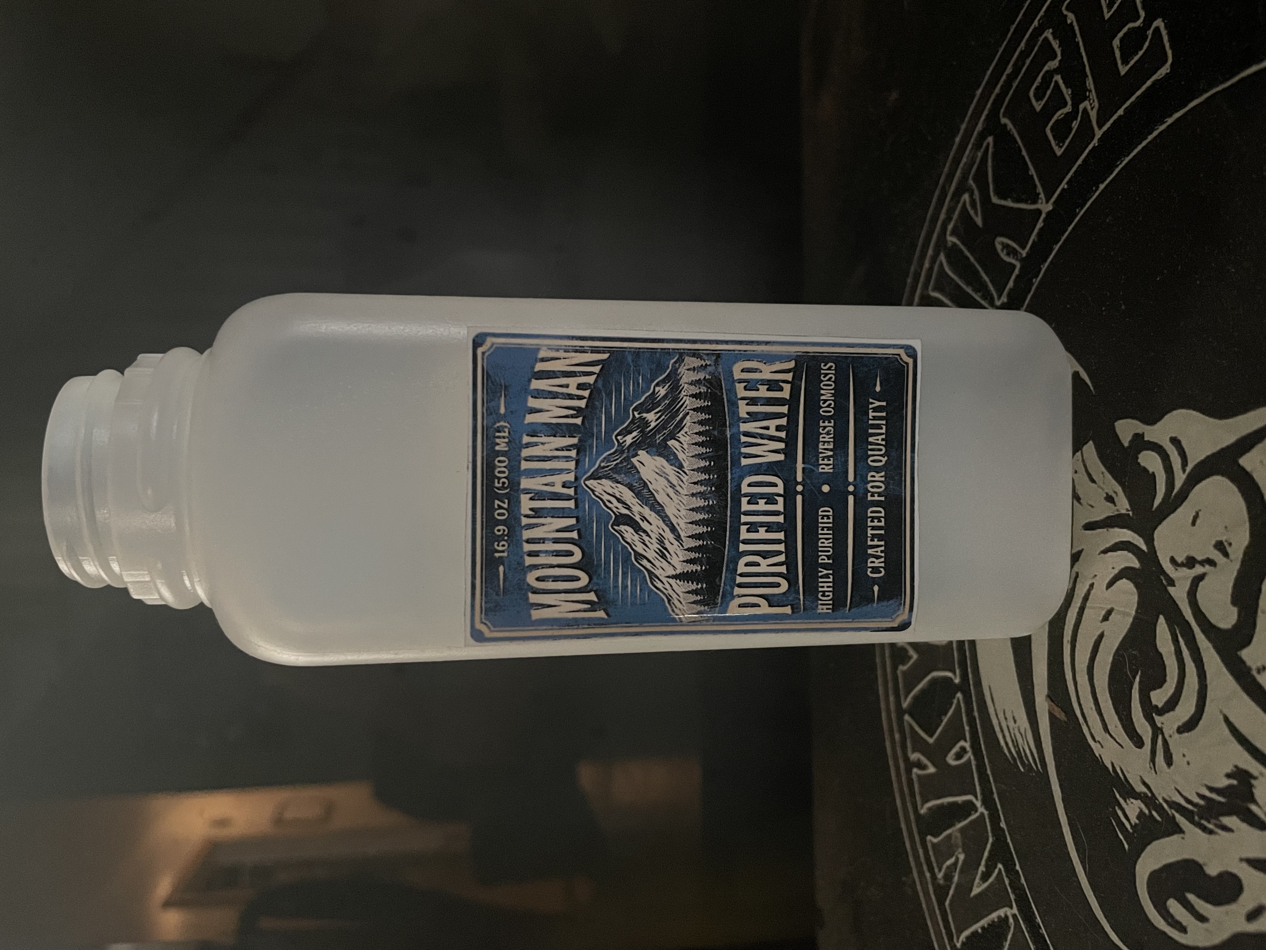Mountain Man Purified Water bottles on display